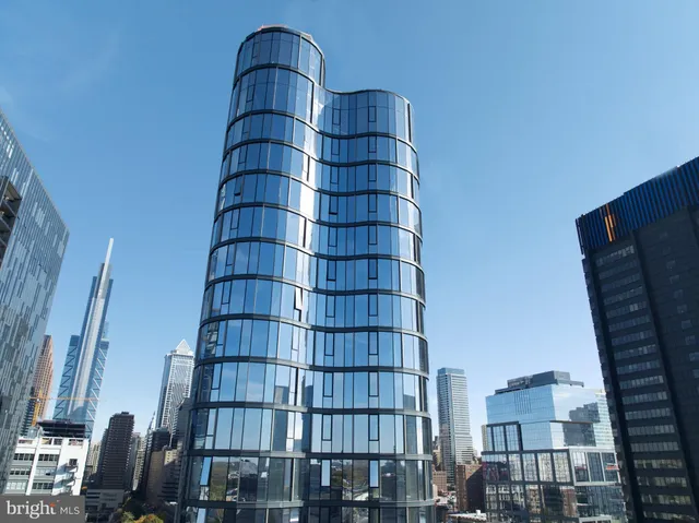 a view of a city with tall buildings