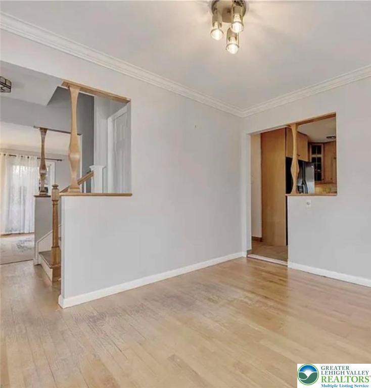 2324 Kemmerer Street Bethlehem, PA 18017 - Photo 13 of 26 a view of a room with wooden floor and a ceiling fan