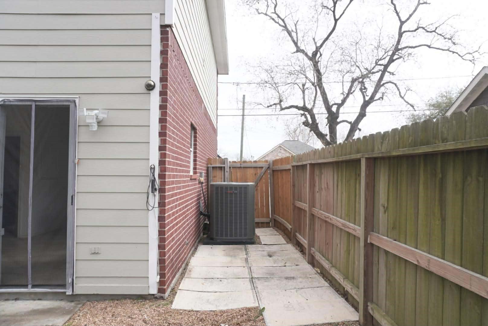 7916 Comal Street Houston, TX 77051 - Photo 20 of 21 a view of a pathway of a house