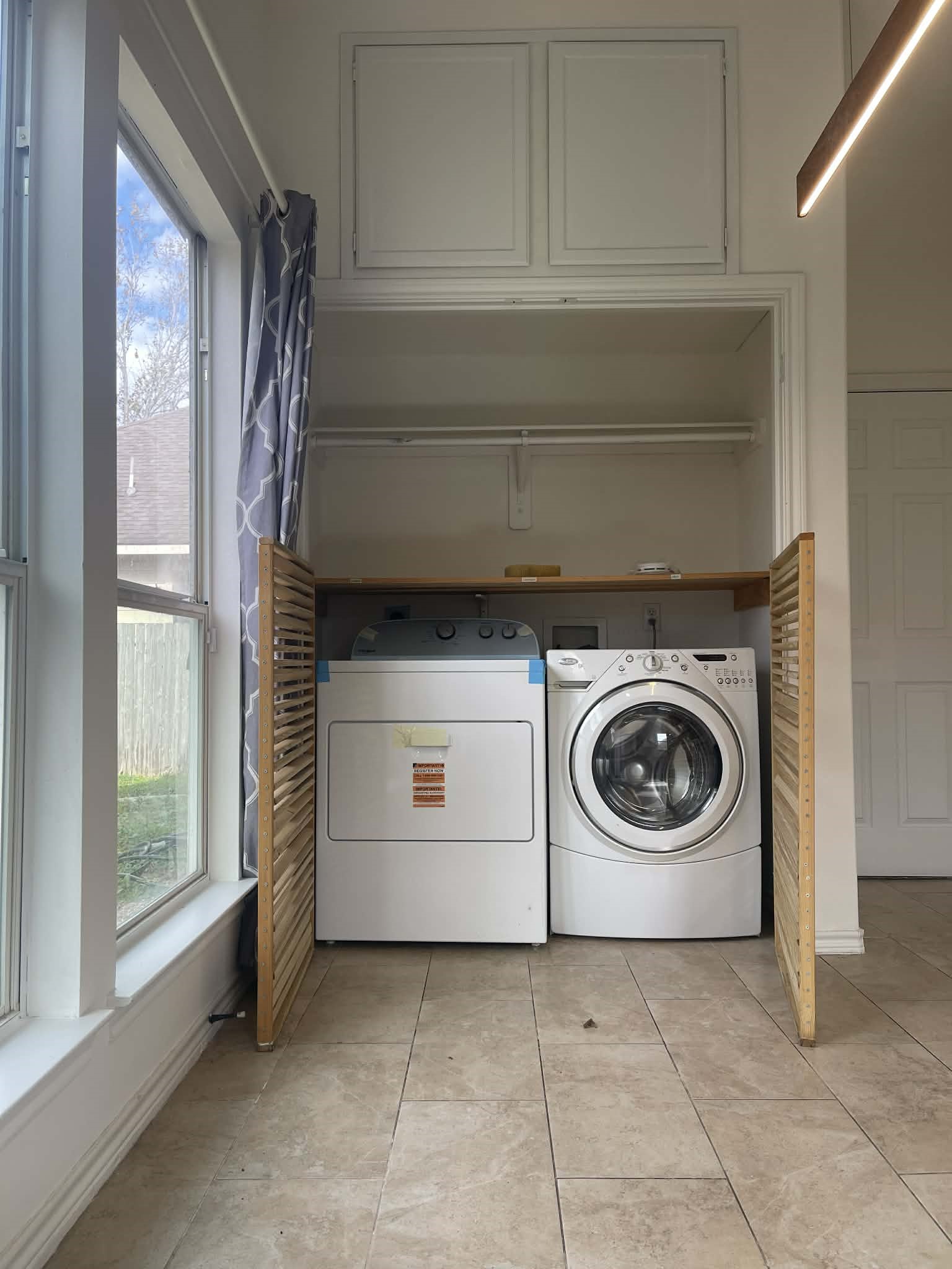 7916 Comal Street Houston, TX 77051 - Photo 7 of 21 a utility room with dryer and washer
