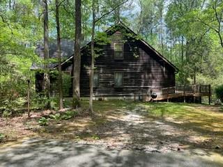 1301 Bob Hunton Road Douglasville, GA 30134 - Photo 5 of 14 a view of backyard of house