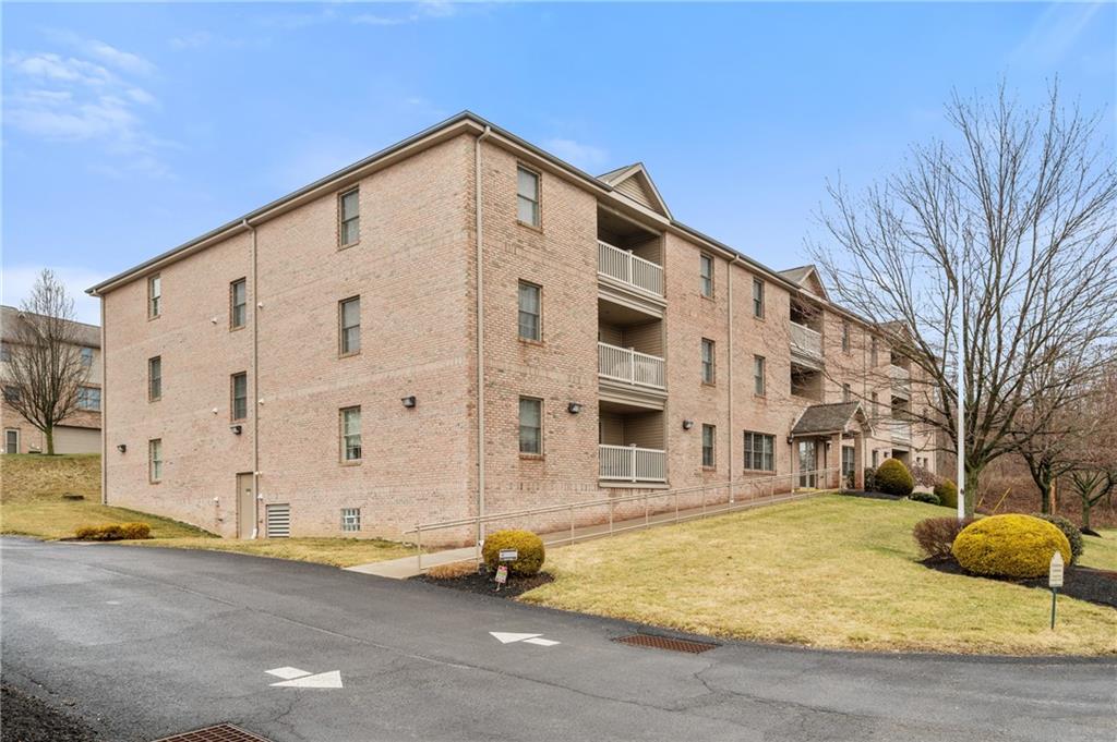 a view of building with large windows
