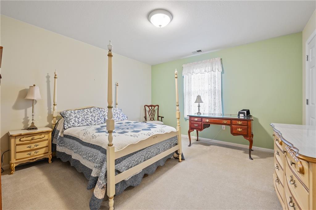 1 Coraopolis Road, Unit 303 Coraopolis, PA 15108 - Photo 16 of 22 a bed room with a bed and window