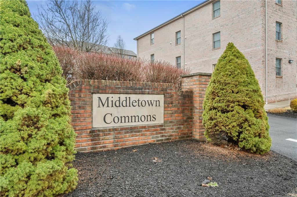 1 Coraopolis Road, Unit 303 Coraopolis, PA 15108 - Photo 2 of 22 a sign on the side of a building