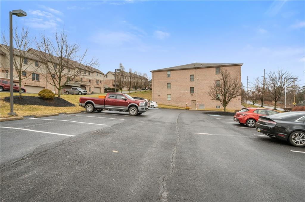 1 Coraopolis Road, Unit 303 Coraopolis, PA 15108 - Photo 22 of 22 a cars parked on the side of a street