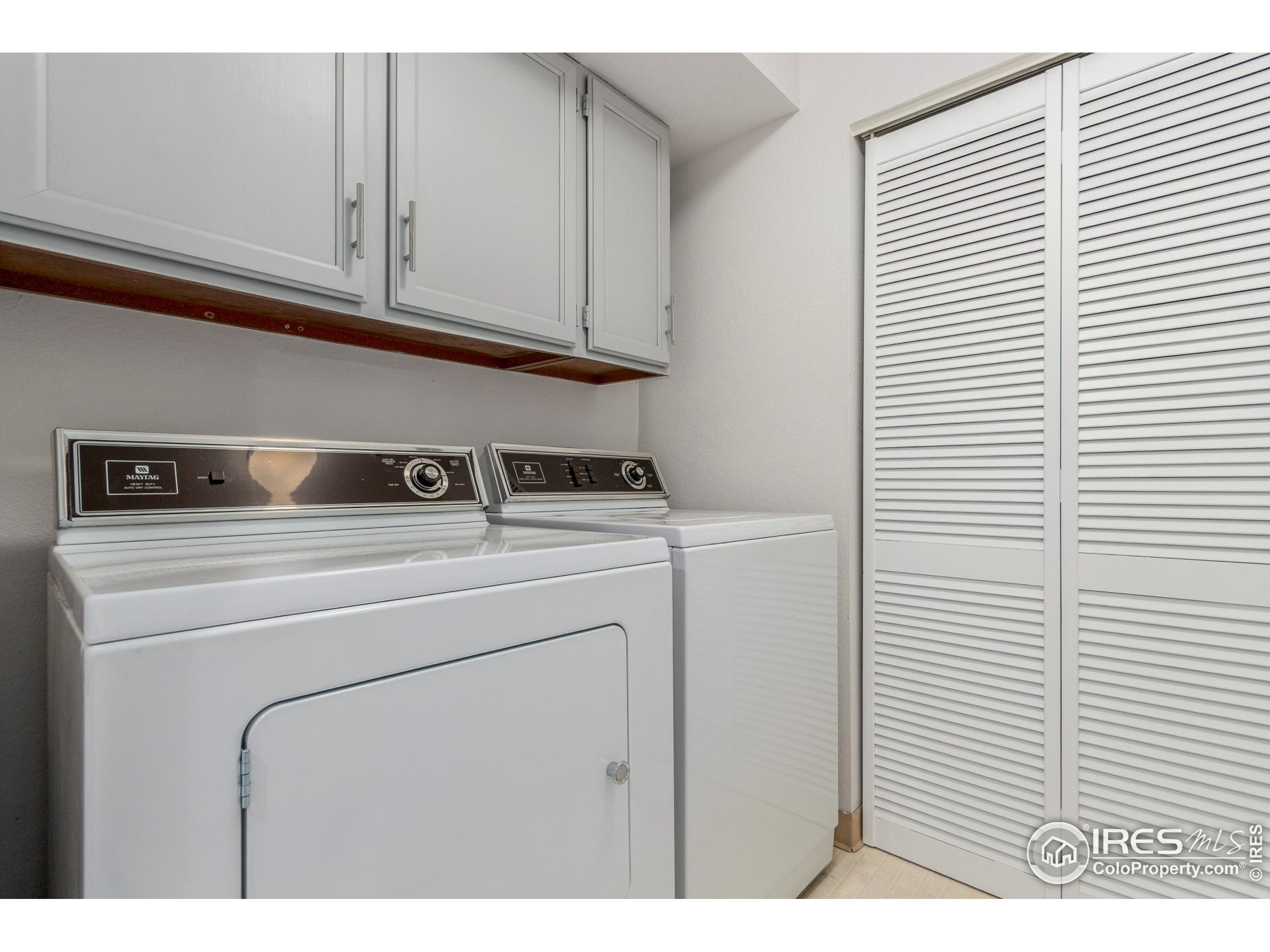 4415 Laguna Place, Unit 201 Boulder, CO 80303 - Photo 20 of 38 a utility room with dryer and washer