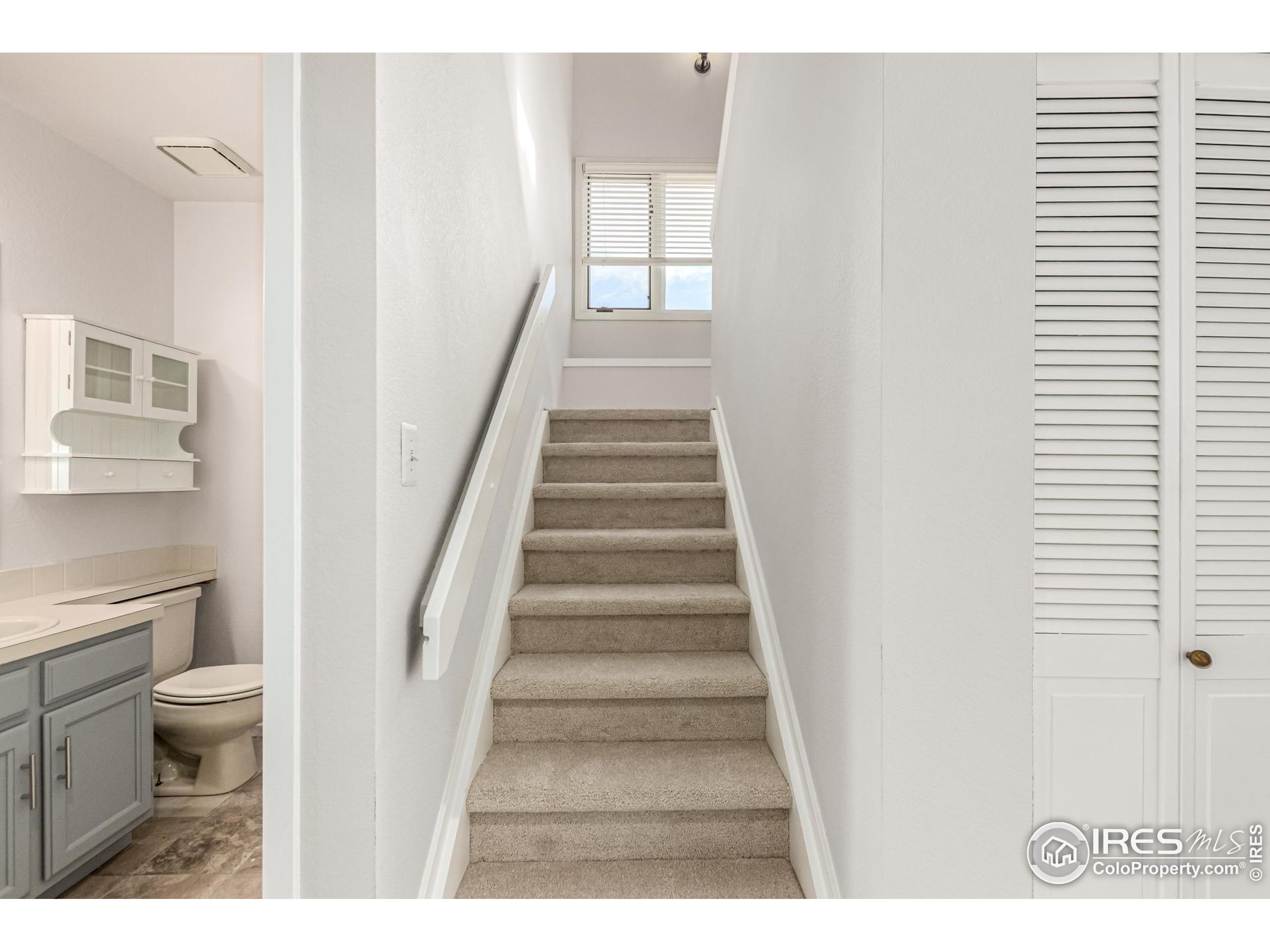 4415 Laguna Place, Unit 201 Boulder, CO 80303 - Photo 28 of 38 a view of entryway and hall with wooden floor
