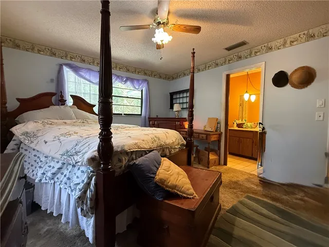 a bathroom with a tub and shower