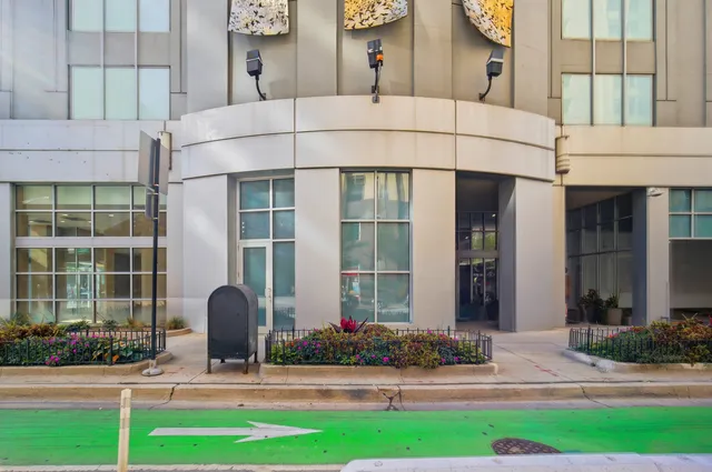 a white building with yard in front of it