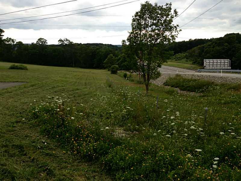636 Pike Run Road Somerset, PA 15501 - Photo 4 of 10 Land. Northeast corner looking down property line along turnpike
