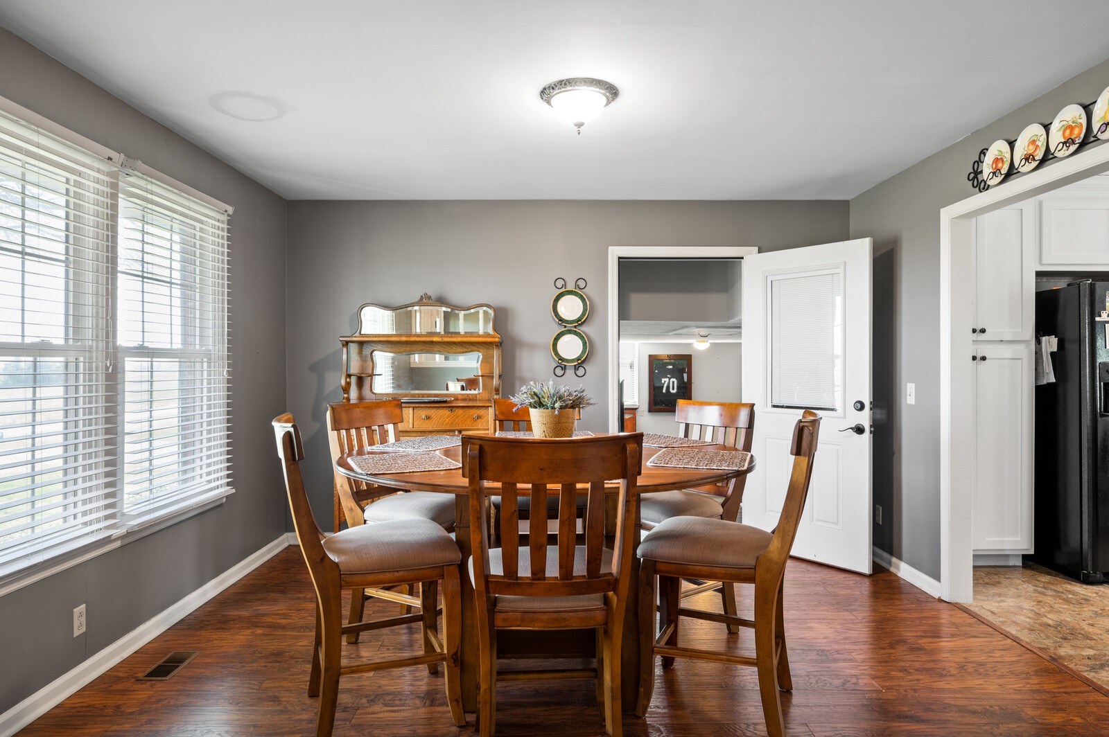 6574 Franklin Road Lebanon, TN 37090 - Photo 3 of 18 a view of a dining room with furniture window and wooden floor