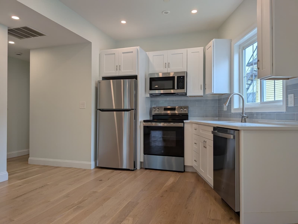 38 Regent Street, Unit 2 Boston, MA 02119 - Photo 2 of 14