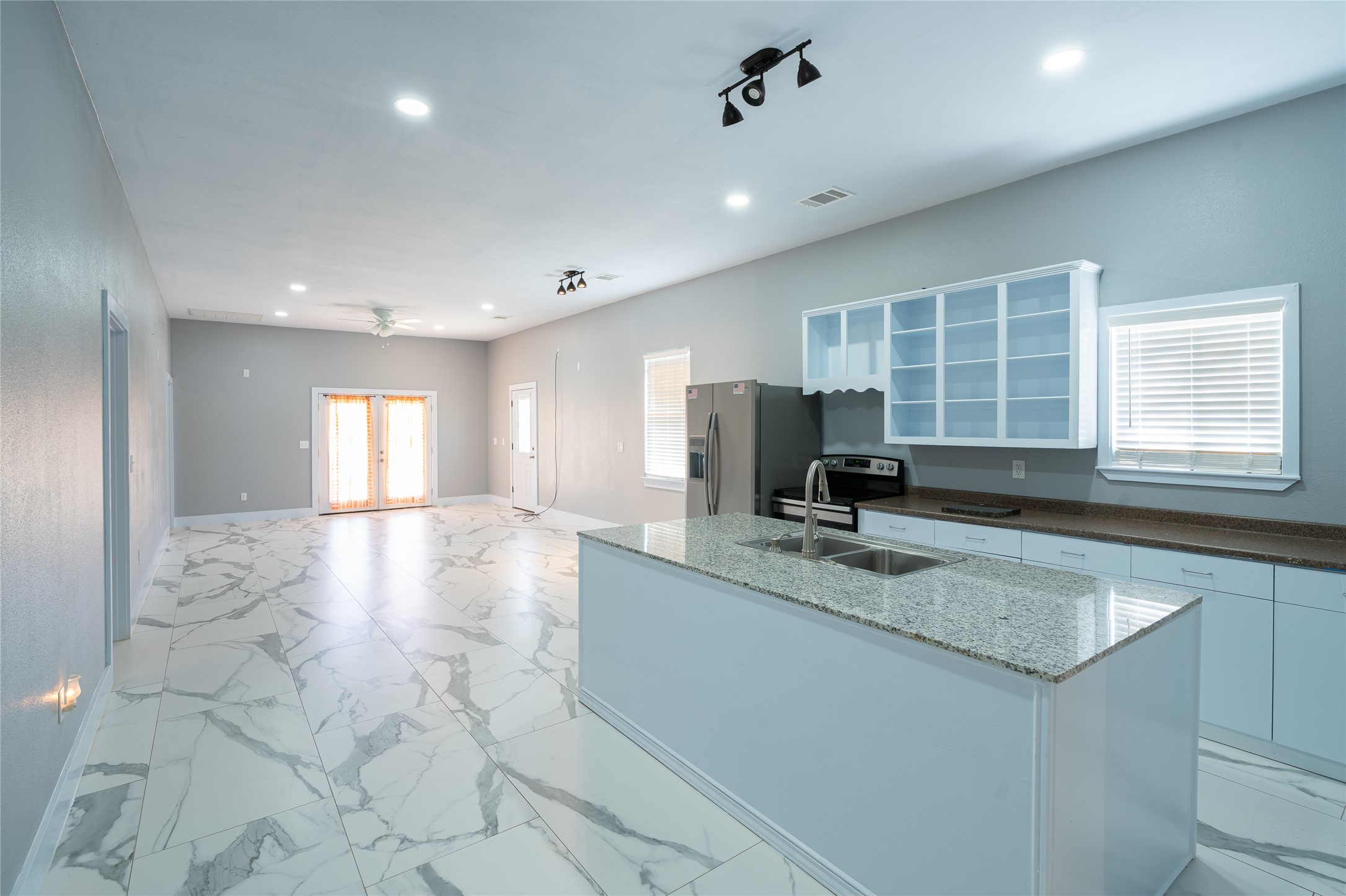 661 Hidden Oak Road Dale, TX 78616 - Photo 11 of 36 a view of a kitchen with a sink and a window