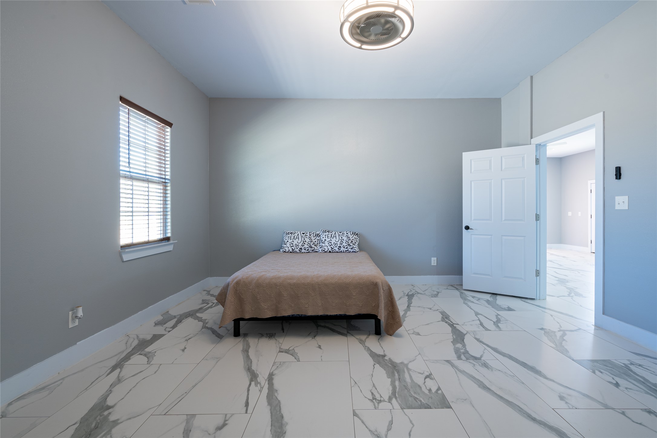 661 Hidden Oak Road Dale, TX 78616 - Photo 16 of 36 a bedroom with a bed and a window