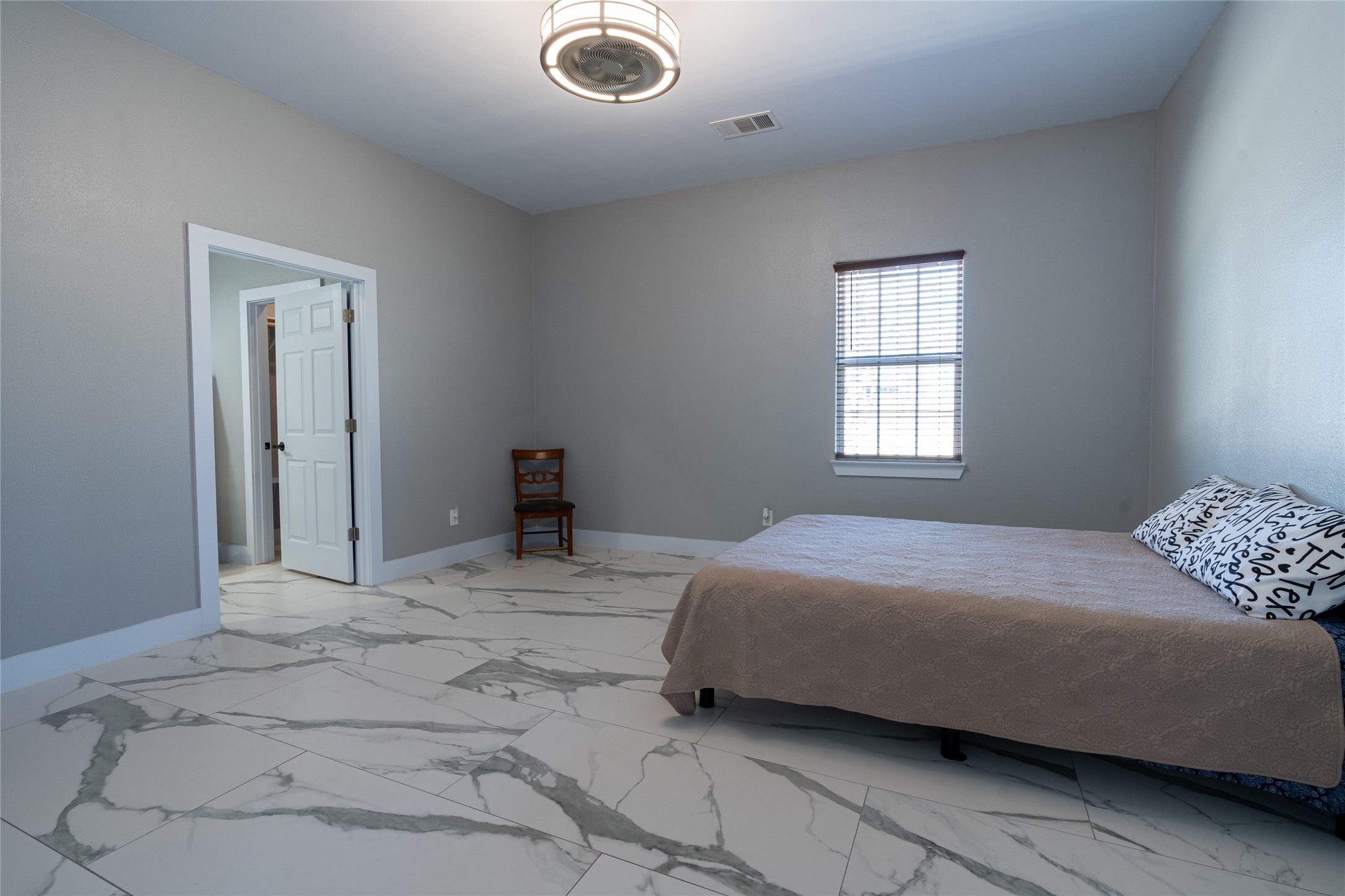 661 Hidden Oak Road Dale, TX 78616 - Photo 18 of 36 a bedroom with a bed and a window