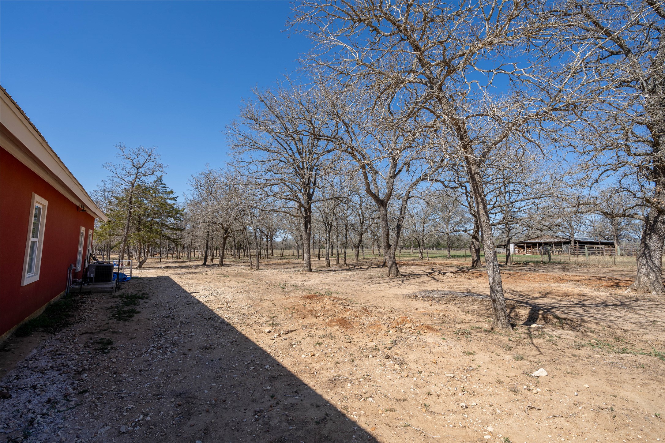 661 Hidden Oak Road Dale, TX 78616 - Photo 23 of 36 a view of yard with trees