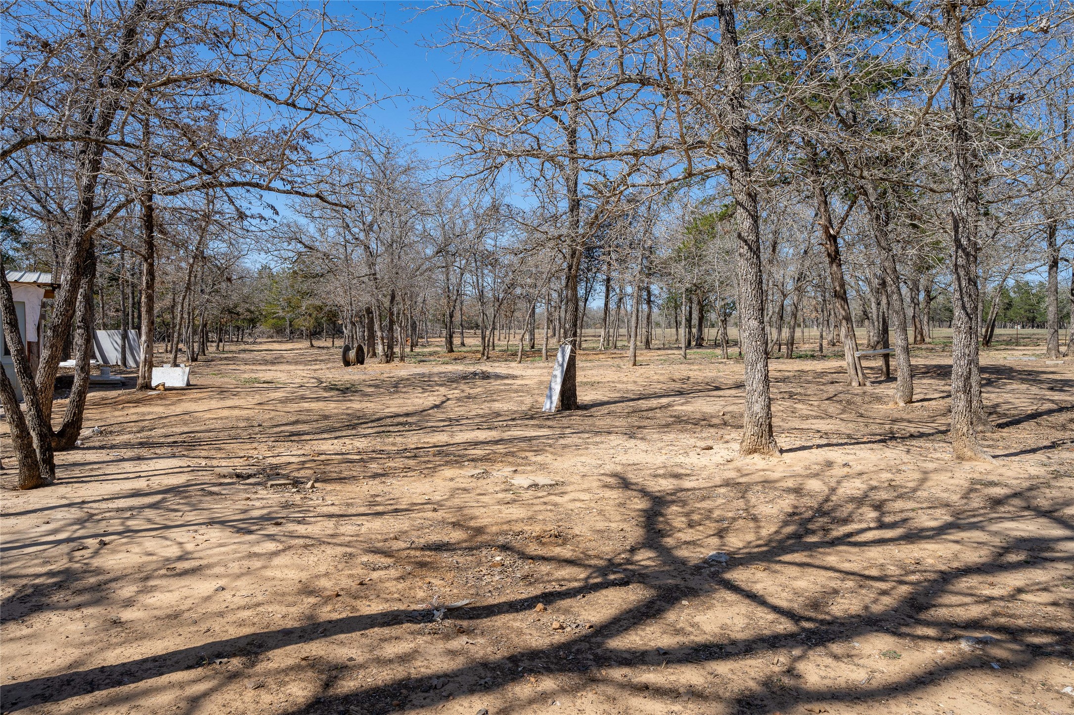 661 Hidden Oak Road Dale, TX 78616 - Photo 27 of 36 a ground view with trees