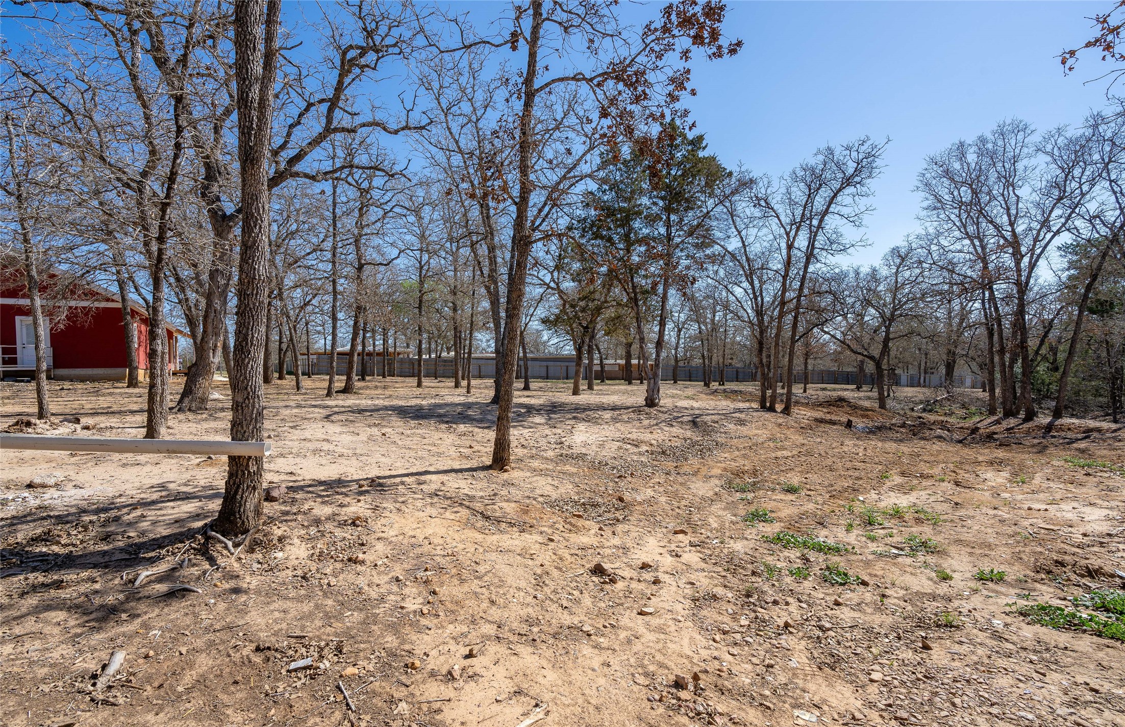 661 Hidden Oak Road Dale, TX 78616 - Photo 28 of 36 a view of outdoor space with trees