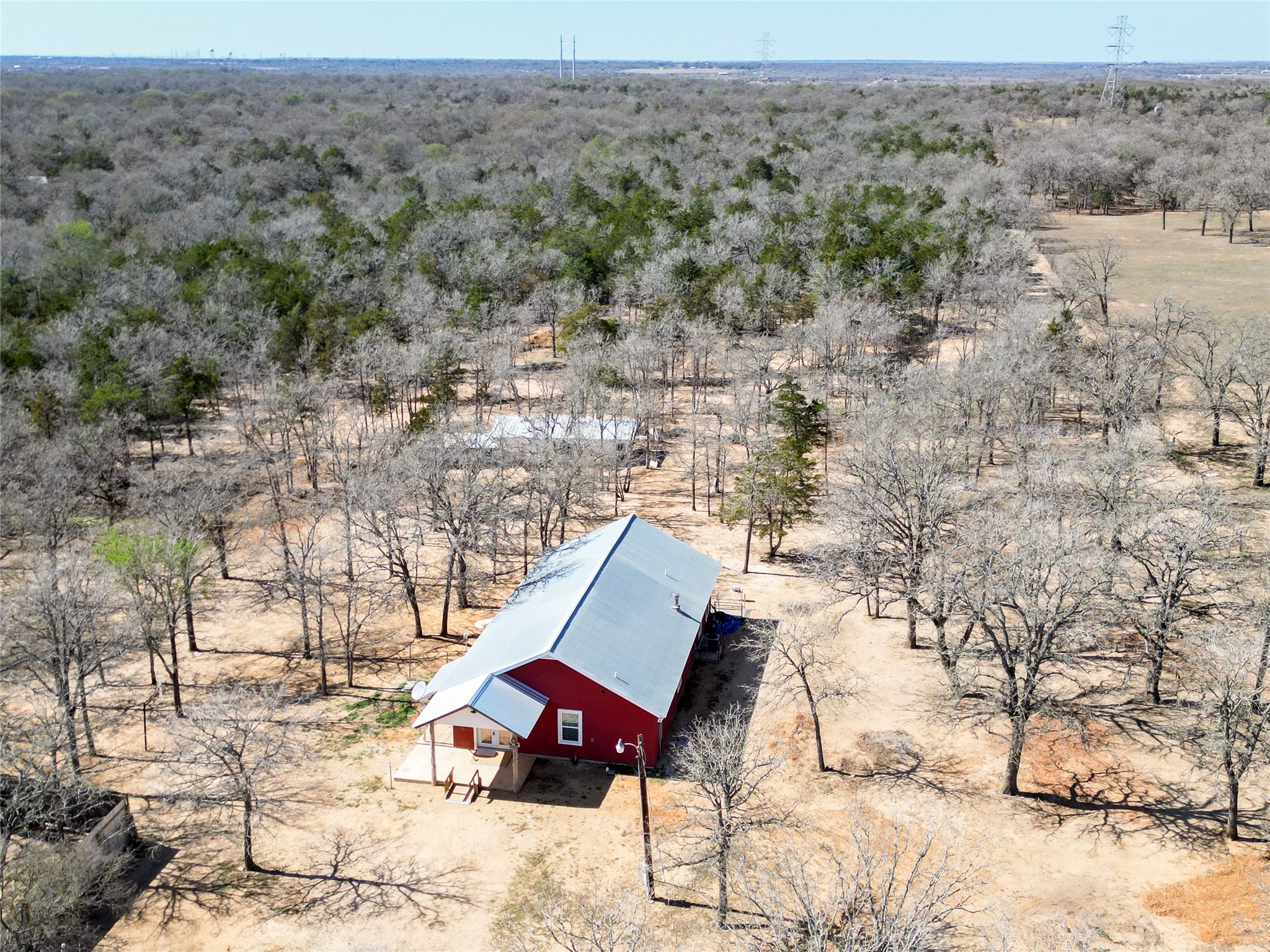 661 Hidden Oak Road Dale, TX 78616 - Photo 4 of 36 a view of lounge chair and trees in the distance