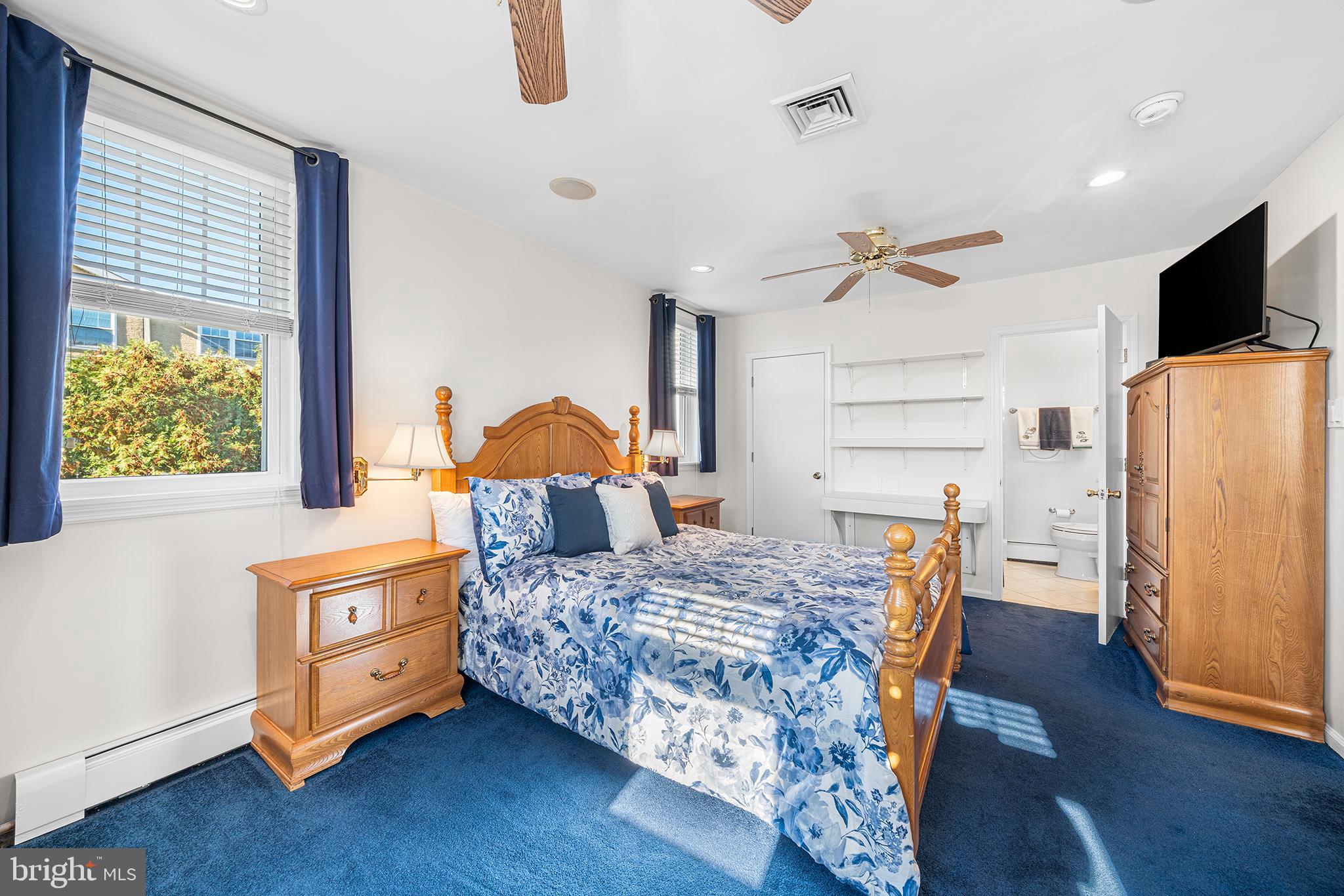 524 Sagamore Road Havertown, PA 19083 - Photo 21 of 43 a bedroom with a bed and wooden floor