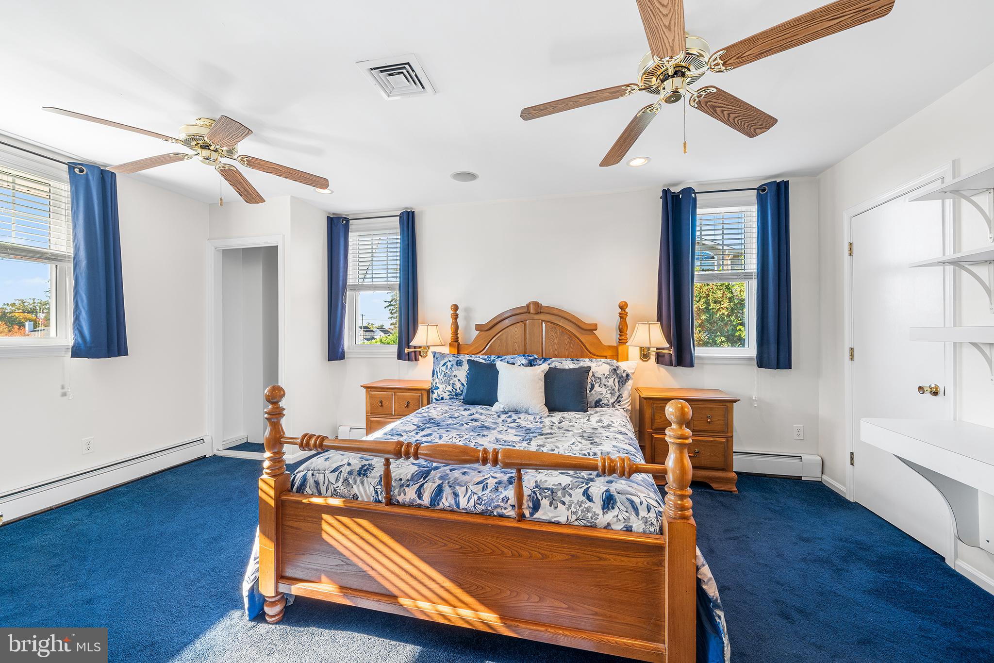 524 Sagamore Road Havertown, PA 19083 - Photo 22 of 43 a bedroom with a bed and a chandelier