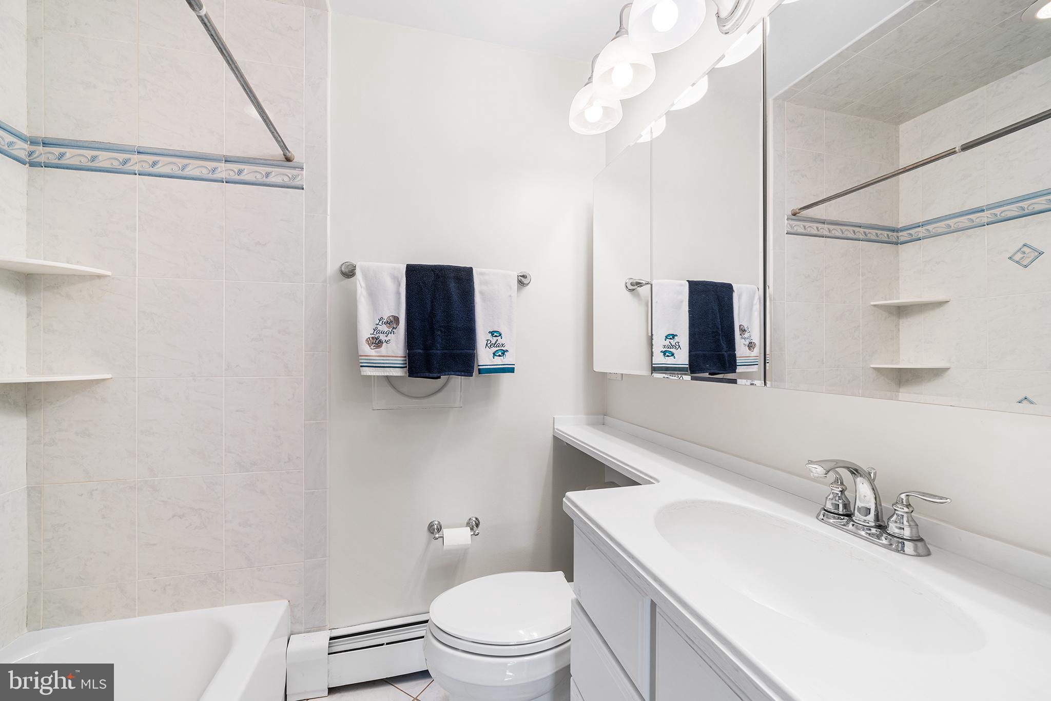 524 Sagamore Road Havertown, PA 19083 - Photo 23 of 43 a bathroom with a sink a toilet and mirror