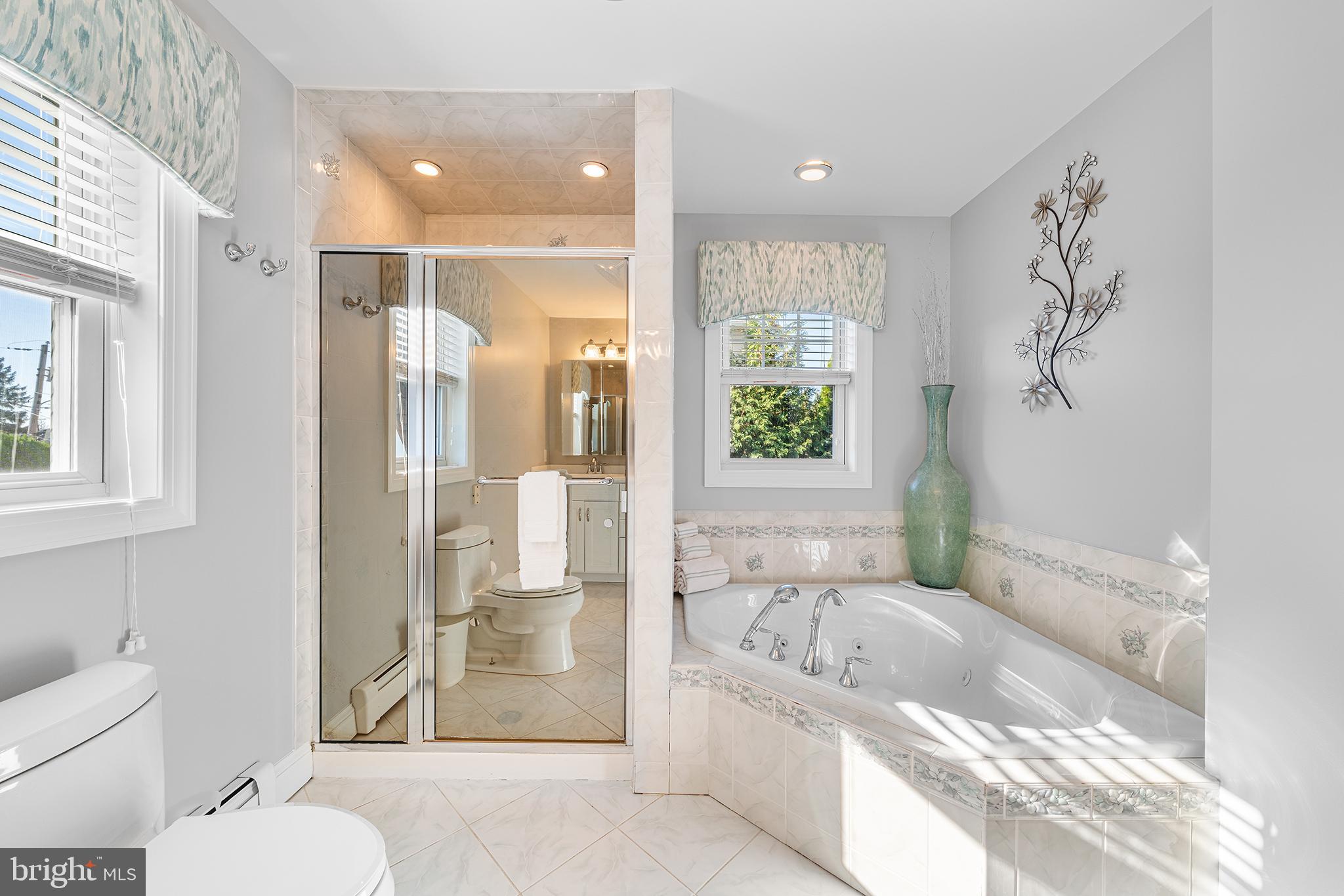 524 Sagamore Road Havertown, PA 19083 - Photo 31 of 43 a bathroom with a granite countertop tub toilet and sink