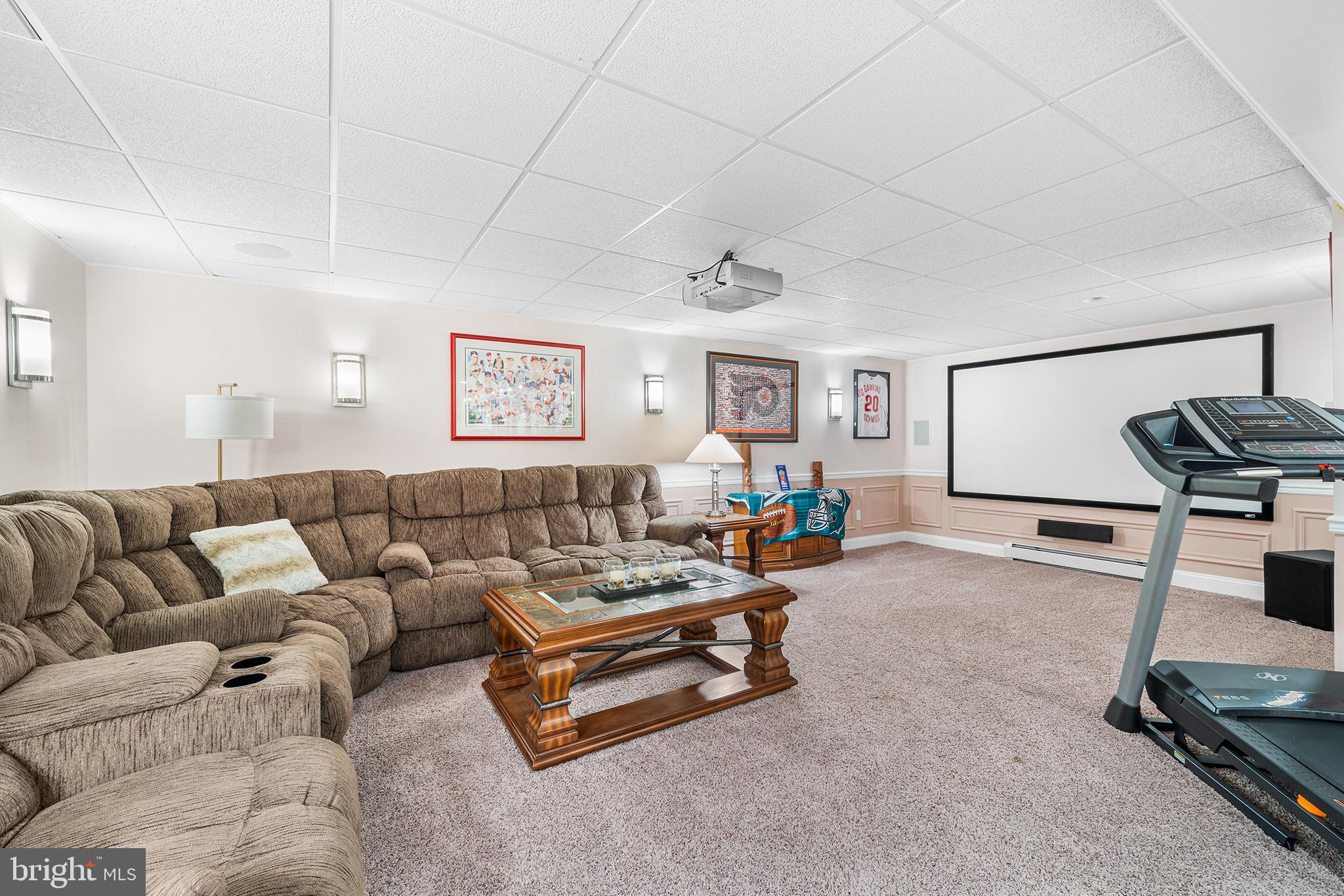 524 Sagamore Road Havertown, PA 19083 - Photo 33 of 43 a living room with furniture gym equipment and a window