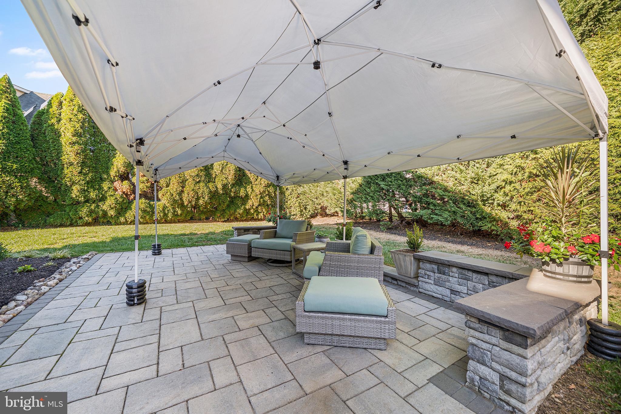 524 Sagamore Road Havertown, PA 19083 - Photo 40 of 43 a view of a patio with a table and chairs