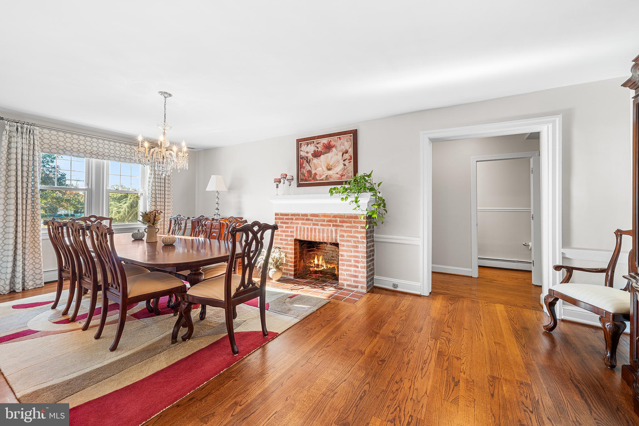 524 Sagamore Road Havertown, PA 19083 - Photo 7 of 43 a dining room with furniture a chandelier and wooden floor