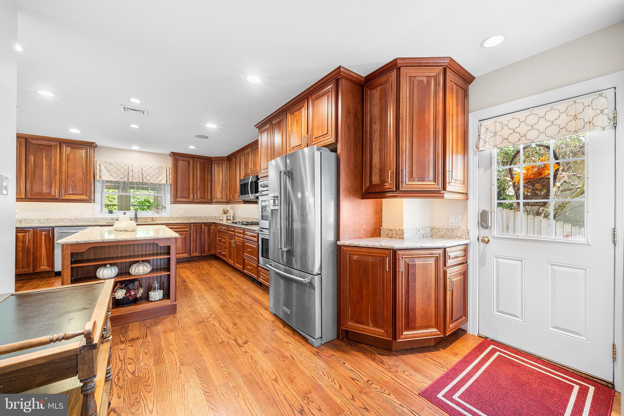 524 Sagamore Road Havertown, PA 19083 - Photo 10 of 43 a kitchen with stainless steel appliances granite countertop a refrigerator and a stove top oven