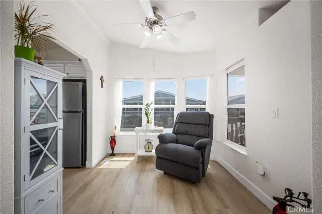 a view of an outdoor space with furniture and umbrella