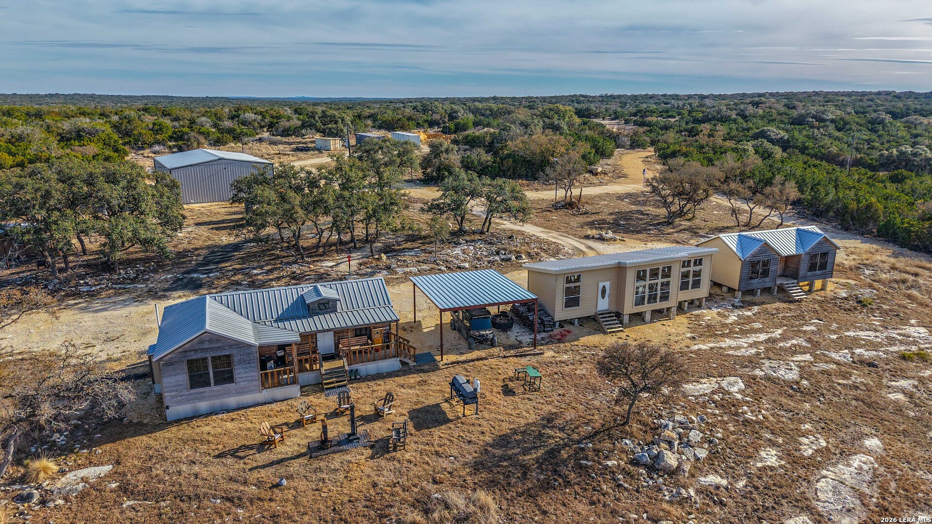 15019 County Road 310 Rocksprings, TX 78880 - Photo 12 of 90 an aerial view of residential houses with outdoor space