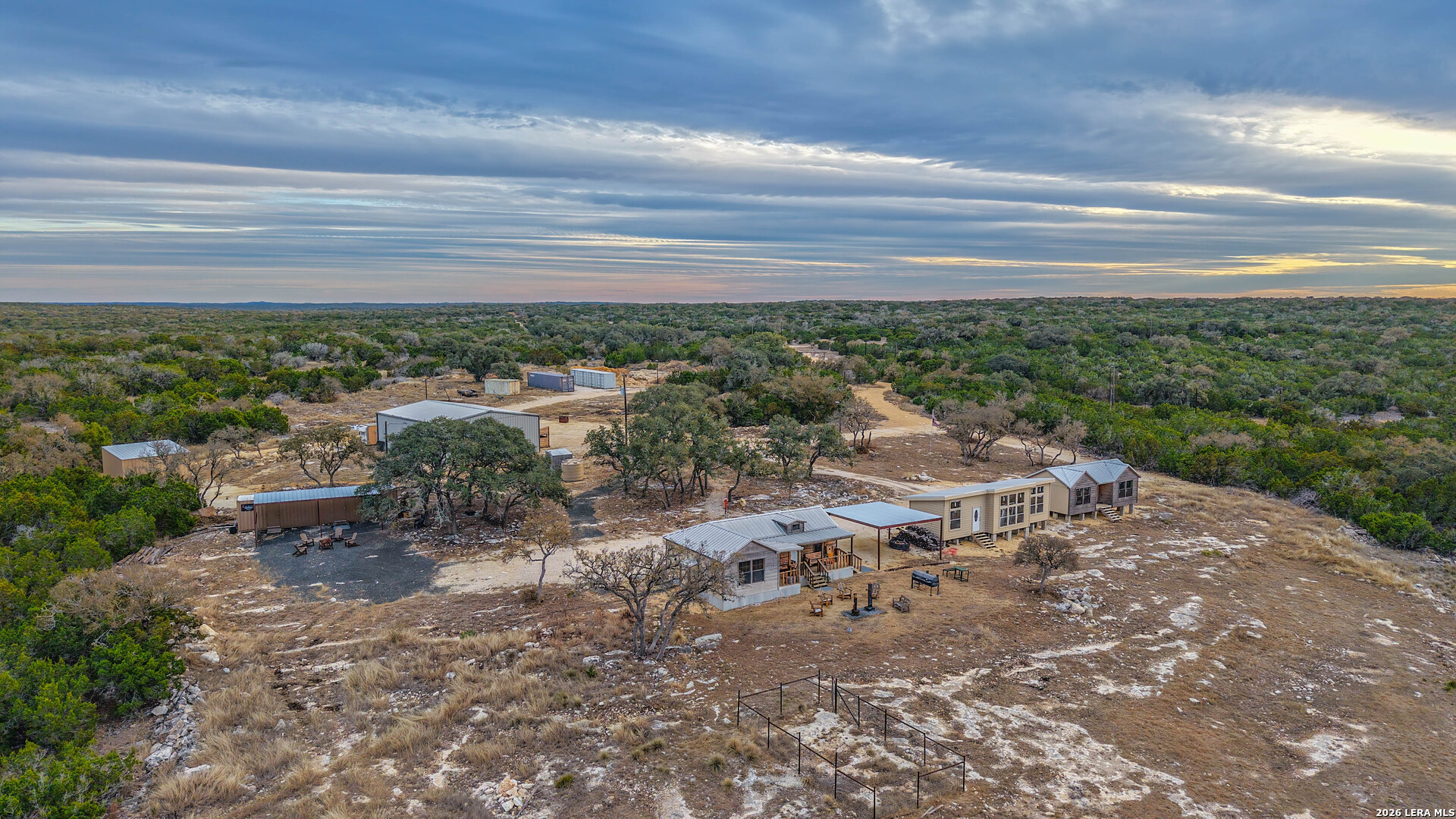 15019 County Road 310 Rocksprings, TX 78880 - Photo 13 of 90 a view of a yard with an outdoor space