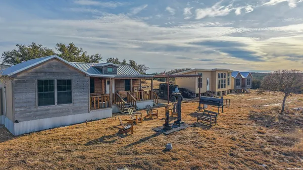 a view of a lake with a yard