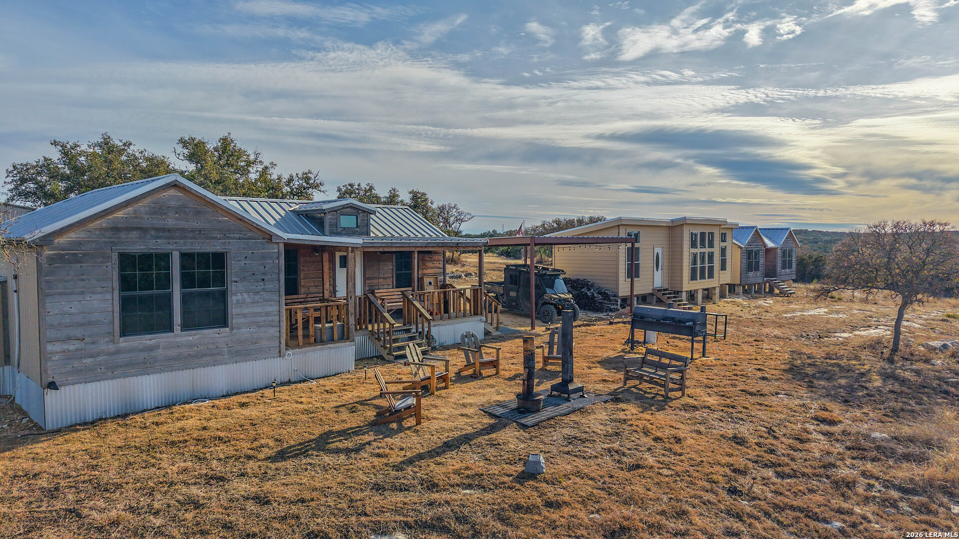 15019 County Road 310 Rocksprings, TX 78880 - Photo 18 of 90 a view of a house with backyard and sitting area