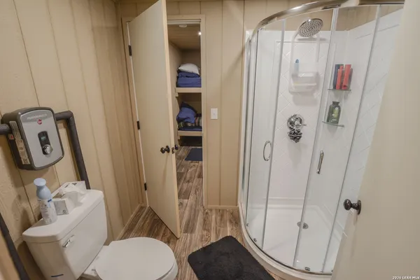 a view of a forest with lush green forest