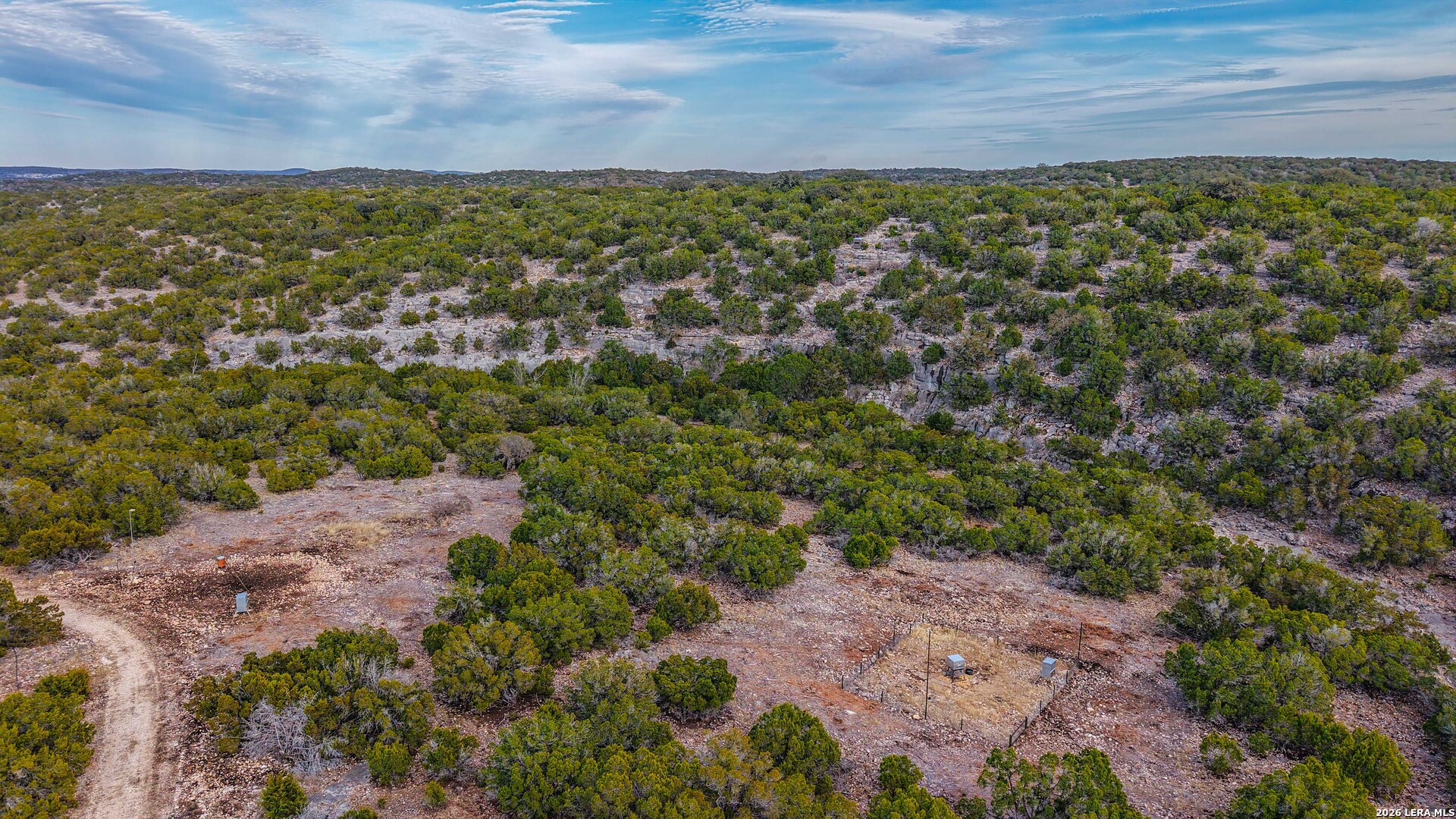 15019 County Road 310 Rocksprings, TX 78880 - Photo 49 of 90 a view of a yard with an outdoor space