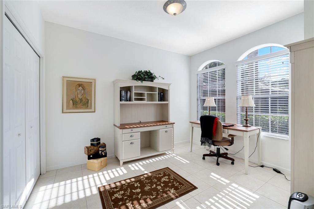 10049 Heather Lane, Unit 101 Naples, FL 34119 - Photo 25 of 28 Office area featuring light tile patterned floors and baseboards