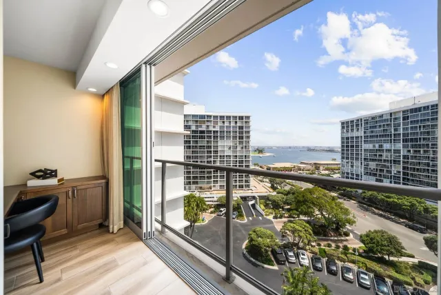 a spacious bathroom with a sink double vanity and a mirror