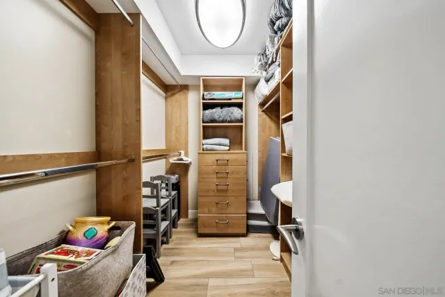 a view of a balcony with wooden floor