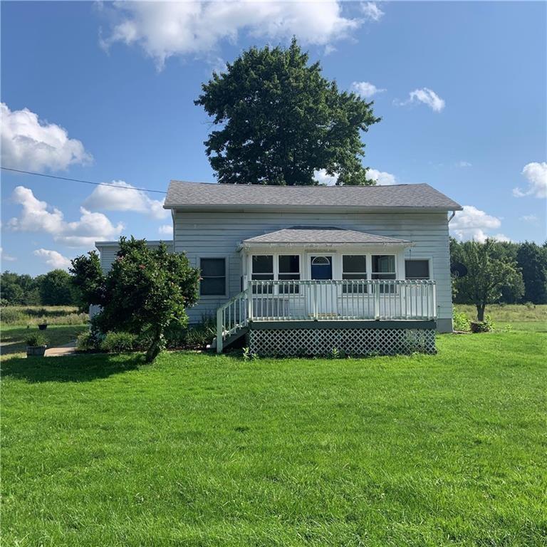 2201 Joiner Road Springboro, PA 16435 - Photo 2 of 25 a view of a house with a garden