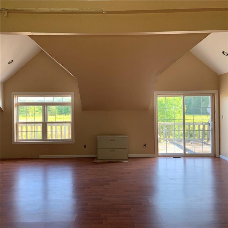 2201 Joiner Road Springboro, PA 16435 - Photo 24 of 25 an empty room with wooden floor and windows