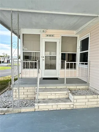 a view of a entryway front of a house