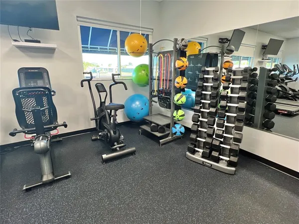 a view of a room with gym equipment