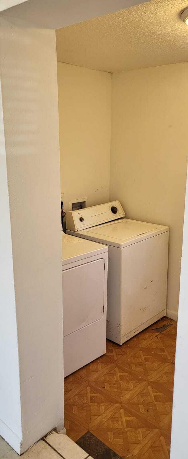 4998 Kirk Road Lake Worth, FL 33461 - Photo 22 of 22 a utility room with dryer and washer