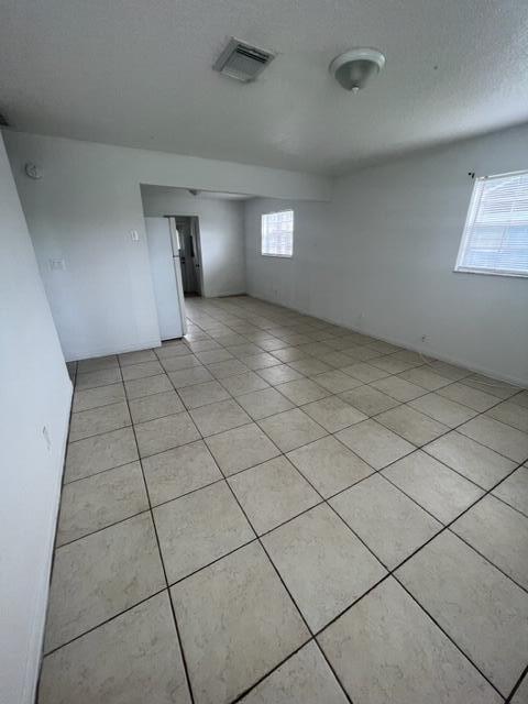 4998 Kirk Road Lake Worth, FL 33461 - Photo 4 of 22 a view of an empty room and window