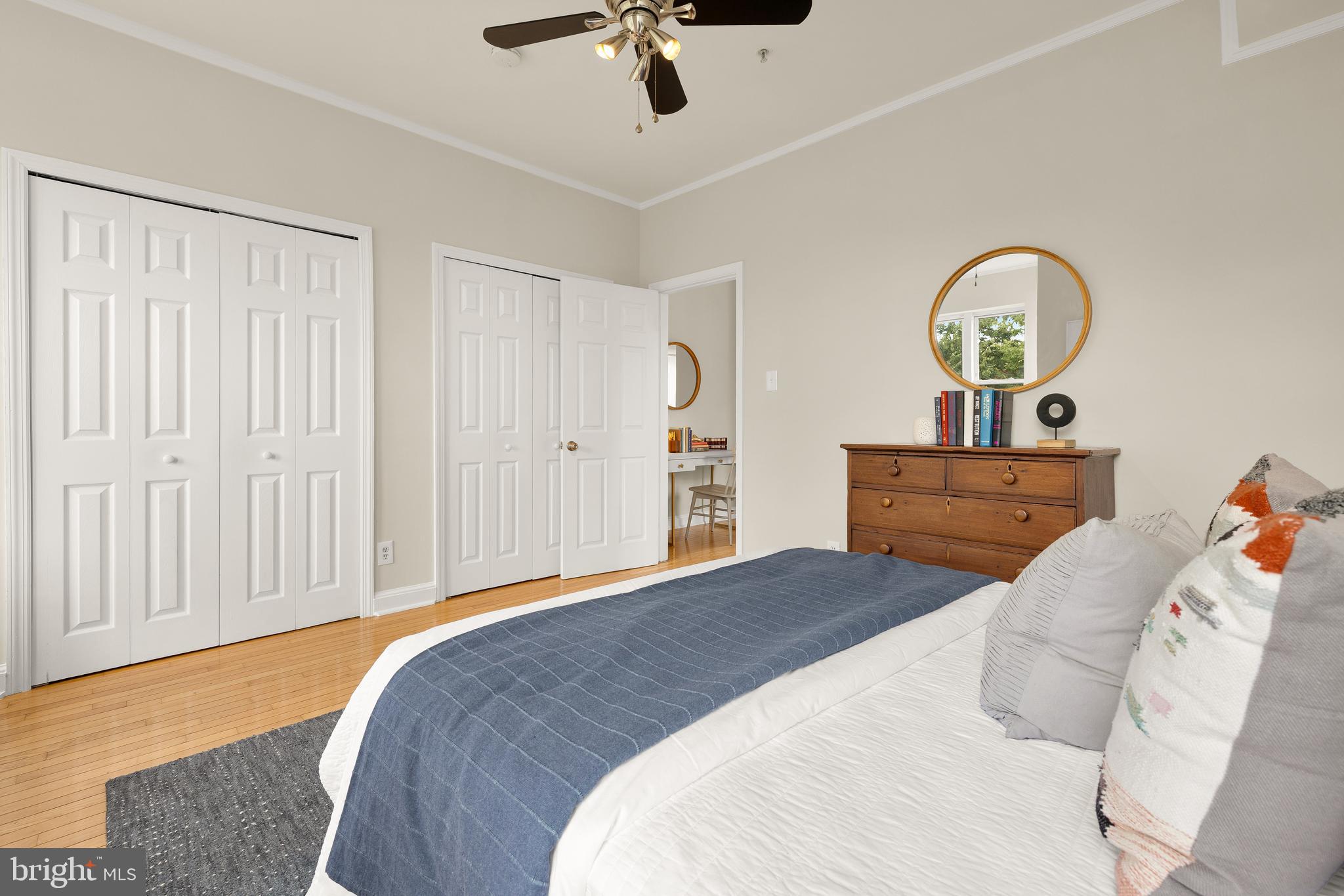 1458 Fairmont Street Northwest, Unit 4 Washington, DC 20009 - Photo 16 of 24 a bedroom with a bed and a dresser