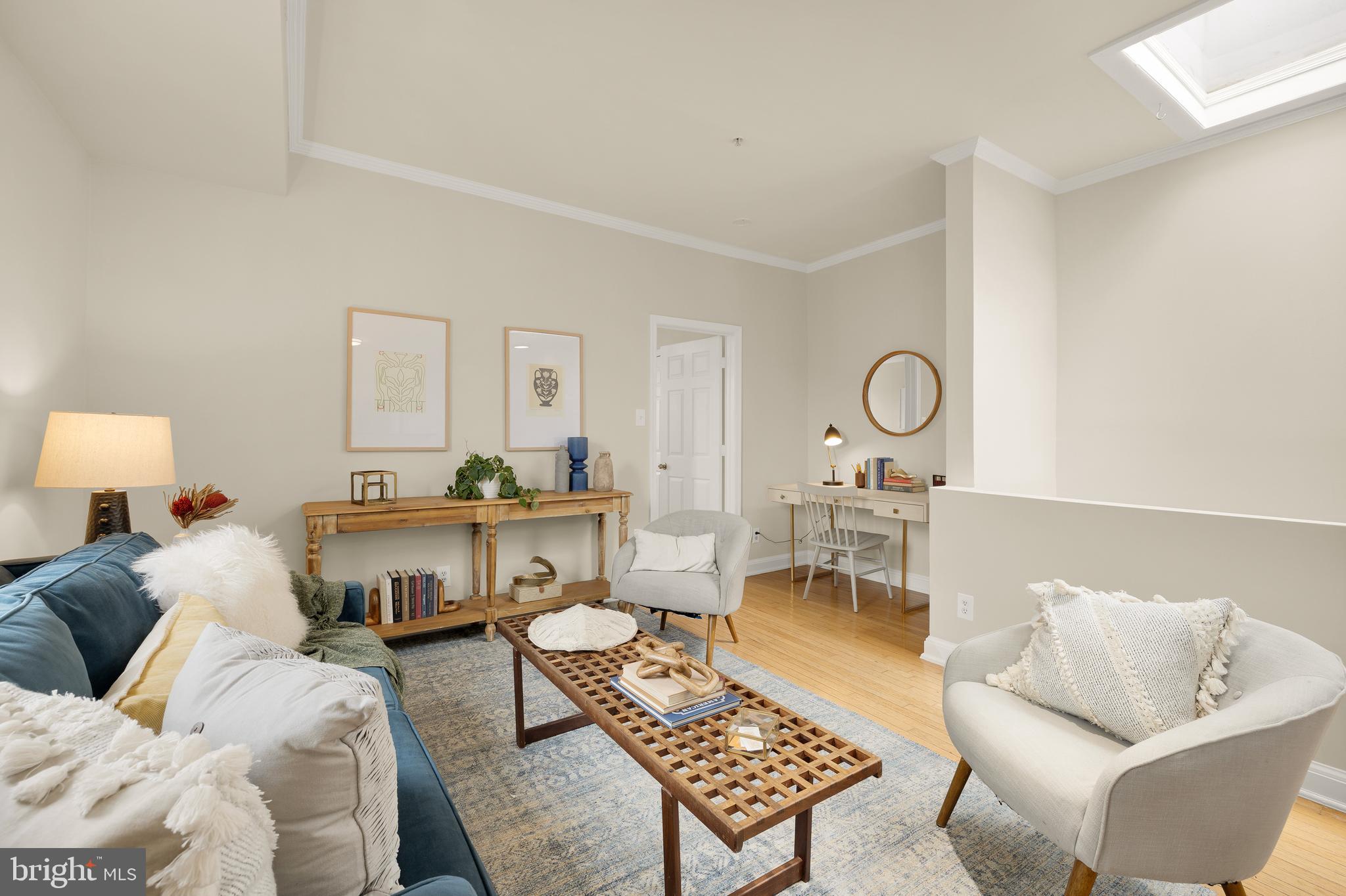 1458 Fairmont Street Northwest, Unit 4 Washington, DC 20009 - Photo 4 of 24 a living room with furniture and a table