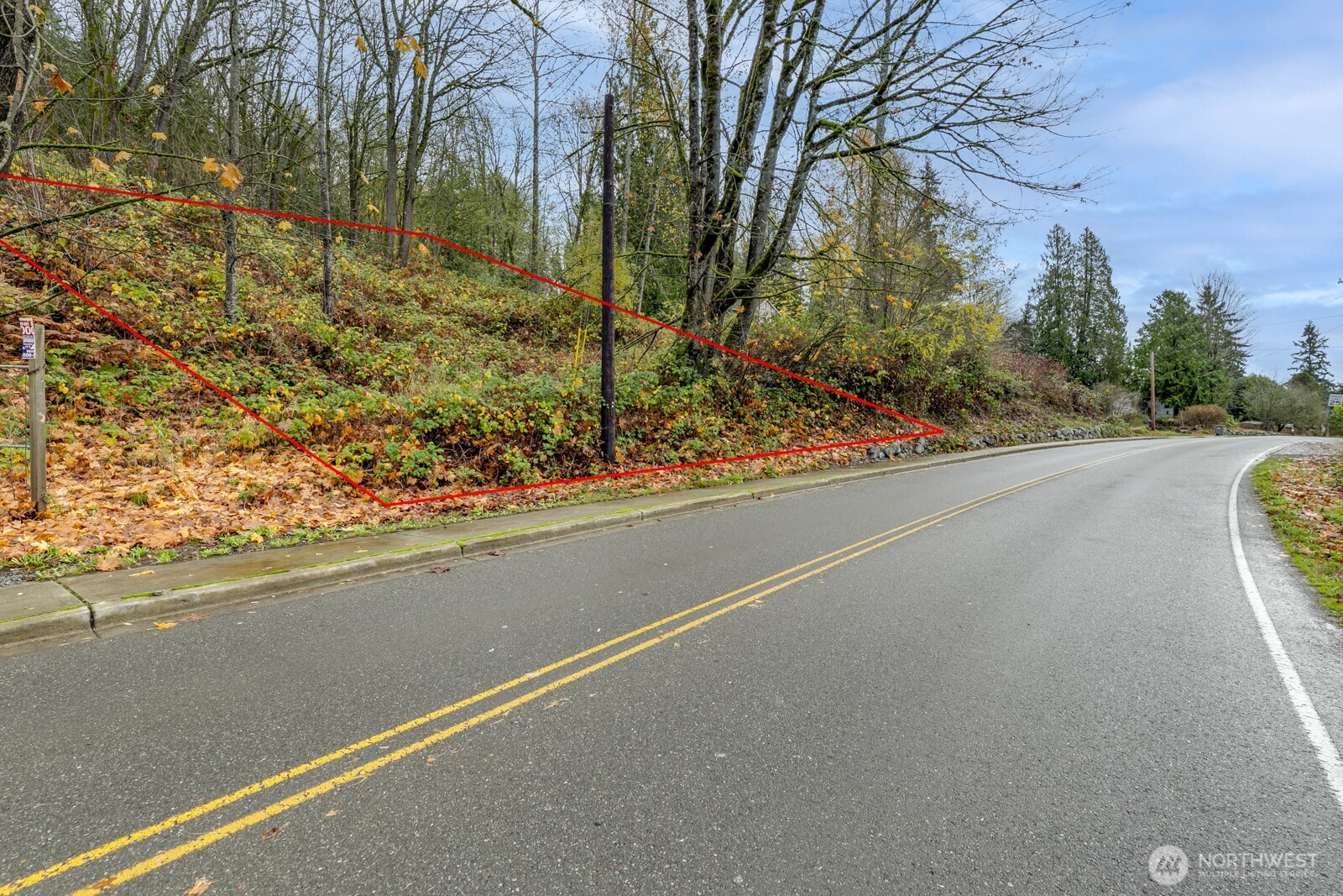 2509 Callow Road Lake Stevens, WA 98258 - Photo 9 of 10 a view of a street with a building and trees in the background